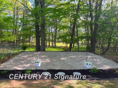 Welcome to 7229 S Lake Bluff! This newly revamped home is on Terrace Bluff Golf Course in Michigan - for sale on GolfHomes.com, golf home, golf lot