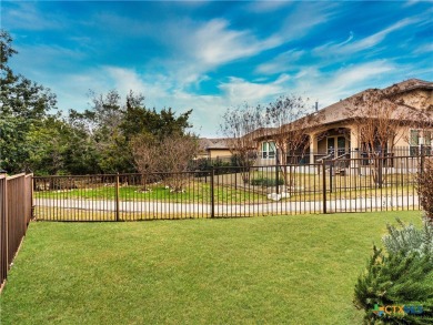 Welcome to this stunning four-bedroom, four and a half bathroom on TPC of San Antonio in Texas - for sale on GolfHomes.com, golf home, golf lot