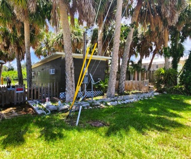 This WATERFRONT home is deemed 100% HABITABLE & ready for on Gulf Harbors Golf Course in Florida - for sale on GolfHomes.com, golf home, golf lot