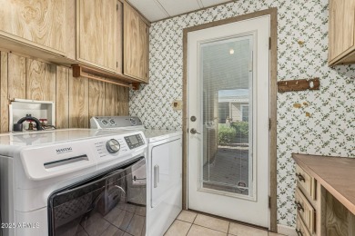 This spacious home features a SPLIT floorplan w/ 3 BEDROOMS & 2 on Sun Lakes Country Club in Arizona - for sale on GolfHomes.com, golf home, golf lot