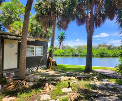 This WATERFRONT home is deemed 100% HABITABLE & ready for on Gulf Harbors Golf Course in Florida - for sale on GolfHomes.com, golf home, golf lot