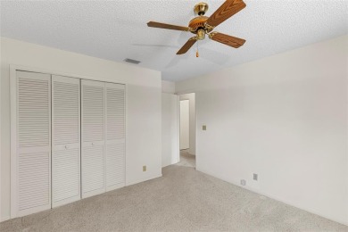 Spacious 3-bed, 2.5-bath townhome with 1-car garage located in on Deer Creek Golf Club in Florida - for sale on GolfHomes.com, golf home, golf lot