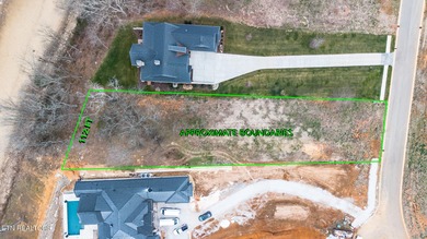 Lot 17 overlooks Watts Bar Lake in the prestigious Tennessee on Tennessee National Golf Club in Tennessee - for sale on GolfHomes.com, golf home, golf lot