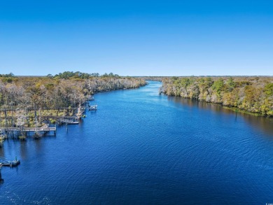 Huge lot in Cypress River Plantation perfect for your custom on Heron Point Golf Club in South Carolina - for sale on GolfHomes.com, golf home, golf lot