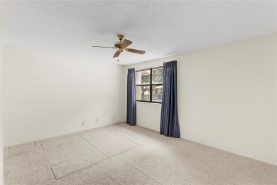 Spacious 3-bed, 2.5-bath townhome with 1-car garage located in on Deer Creek Golf Club in Florida - for sale on GolfHomes.com, golf home, golf lot