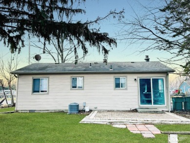 Tucked away on a peaceful dead-end street, this beautifully on Lake Erie Metropark Golf Course in Michigan - for sale on GolfHomes.com, golf home, golf lot