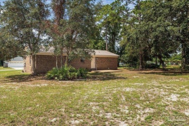 New 2025 Roof!  Why rent when you can own?  All Brick 3 bedroom on Tiger Point Golf and Country Club in Florida - for sale on GolfHomes.com, golf home, golf lot