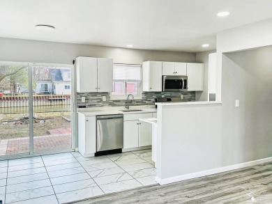 Tucked away on a peaceful dead-end street, this beautifully on Lake Erie Metropark Golf Course in Michigan - for sale on GolfHomes.com, golf home, golf lot