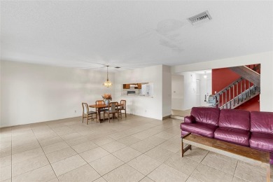 Spacious 3-bed, 2.5-bath townhome with 1-car garage located in on Deer Creek Golf Club in Florida - for sale on GolfHomes.com, golf home, golf lot