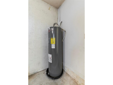 Spacious 3-bed, 2.5-bath townhome with 1-car garage located in on Deer Creek Golf Club in Florida - for sale on GolfHomes.com, golf home, golf lot