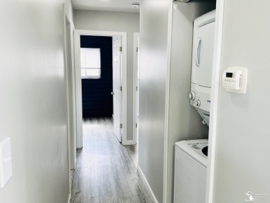 Tucked away on a peaceful dead-end street, this beautifully on Lake Erie Metropark Golf Course in Michigan - for sale on GolfHomes.com, golf home, golf lot