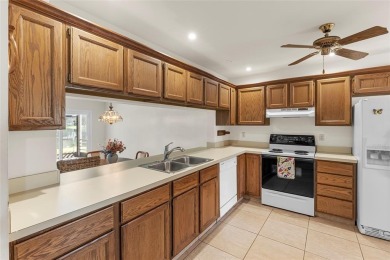 Spacious 3-bed, 2.5-bath townhome with 1-car garage located in on Deer Creek Golf Club in Florida - for sale on GolfHomes.com, golf home, golf lot