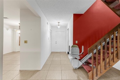 Spacious 3-bed, 2.5-bath townhome with 1-car garage located in on Deer Creek Golf Club in Florida - for sale on GolfHomes.com, golf home, golf lot