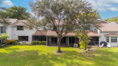 Spacious 3-bed, 2.5-bath townhome with 1-car garage located in on Deer Creek Golf Club in Florida - for sale on GolfHomes.com, golf home, golf lot