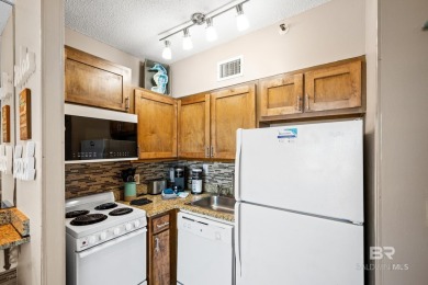Cozy SunSuite condo in Royal Gulf Beach & Racquet Club. Located on Craft Farms - Cypress Bend in Alabama - for sale on GolfHomes.com, golf home, golf lot
