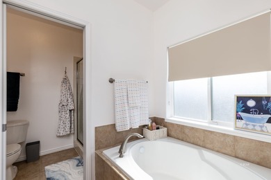 Charming single-family home on just over 1 acre. This 3-bed, 2.5 on Spring Creek Golf Course in Nevada - for sale on GolfHomes.com, golf home, golf lot