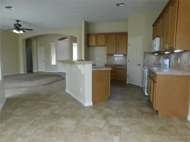 Home is located on a large lot. New interior paint, ceiling fans on Laughlin Ranch Golf Club in Arizona - for sale on GolfHomes.com, golf home, golf lot