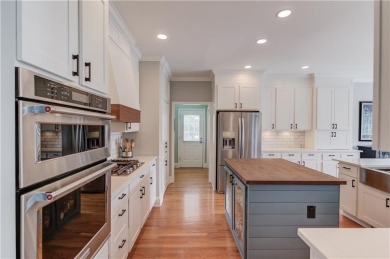 Welcome to this breathtaking 6-bedroom, 5-bathroom home offering on Hamilton Mill Golf Club in Georgia - for sale on GolfHomes.com, golf home, golf lot