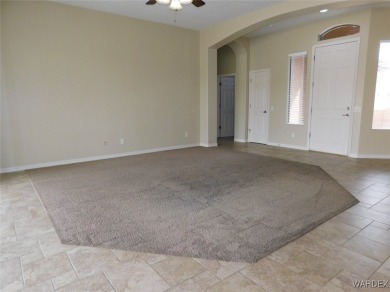 Home is located on a large lot. New interior paint, ceiling fans on Laughlin Ranch Golf Club in Arizona - for sale on GolfHomes.com, golf home, golf lot