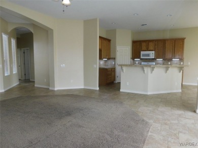 Home is located on a large lot. New interior paint, ceiling fans on Laughlin Ranch Golf Club in Arizona - for sale on GolfHomes.com, golf home, golf lot