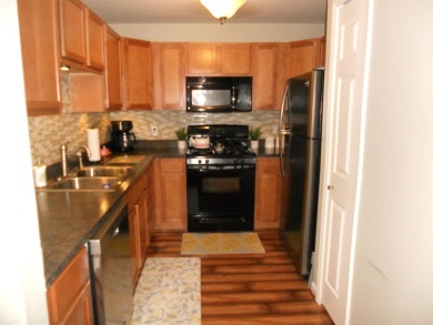 BEAUTIFULLY UPGRADED, SPOTLESS TOWNHOUSE CONDO IN CENTRAL SHELBY on Cherry Creek Golf Club in Michigan - for sale on GolfHomes.com, golf home, golf lot