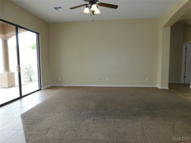 Home is located on a large lot. New interior paint, ceiling fans on Laughlin Ranch Golf Club in Arizona - for sale on GolfHomes.com, golf home, golf lot