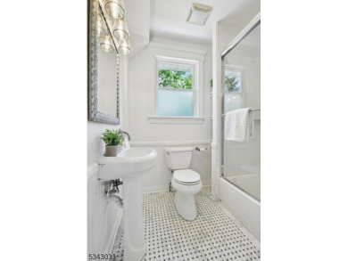 Set in the heart of the coveted Golf Island neighborhood, this on Maplewood Country Club in New Jersey - for sale on GolfHomes.com, golf home, golf lot