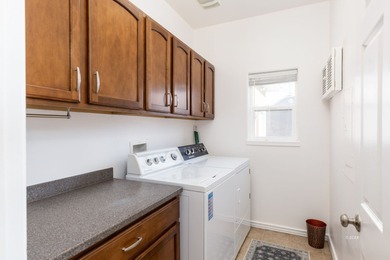 Charming single-family home on just over 1 acre. This 3-bed, 2.5 on Spring Creek Golf Course in Nevada - for sale on GolfHomes.com, golf home, golf lot