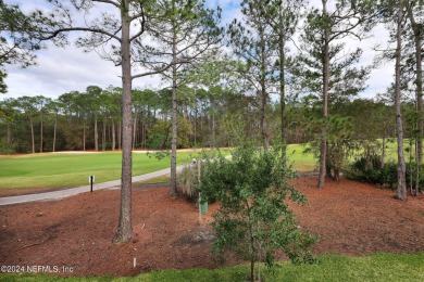This super clean and updated 2nd floor end unit has lots of on Slammer and Squire Golf Course in Florida - for sale on GolfHomes.com, golf home, golf lot