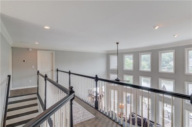 Welcome to this breathtaking 6-bedroom, 5-bathroom home offering on Hamilton Mill Golf Club in Georgia - for sale on GolfHomes.com, golf home, golf lot