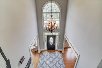 Welcome to this breathtaking 6-bedroom, 5-bathroom home offering on Hamilton Mill Golf Club in Georgia - for sale on GolfHomes.com, golf home, golf lot