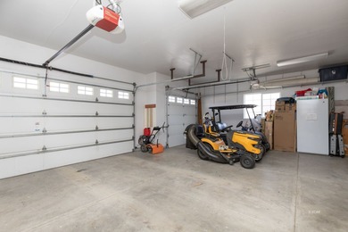 Charming single-family home on just over 1 acre. This 3-bed, 2.5 on Spring Creek Golf Course in Nevada - for sale on GolfHomes.com, golf home, golf lot