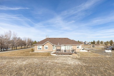 Charming single-family home on just over 1 acre. This 3-bed, 2.5 on Spring Creek Golf Course in Nevada - for sale on GolfHomes.com, golf home, golf lot