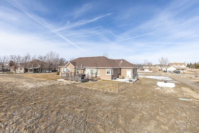 Charming single-family home on just over 1 acre. This 3-bed, 2.5 on Spring Creek Golf Course in Nevada - for sale on GolfHomes.com, golf home, golf lot