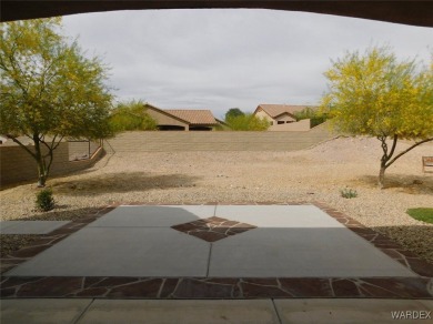 Home is located on a large lot. New interior paint, ceiling fans on Laughlin Ranch Golf Club in Arizona - for sale on GolfHomes.com, golf home, golf lot