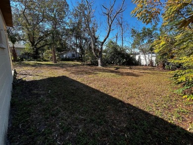 This house is for Sale.  Charming Home with Golf Course Views in on Babe Zaharias Golf Course in Florida - for sale on GolfHomes.com, golf home, golf lot