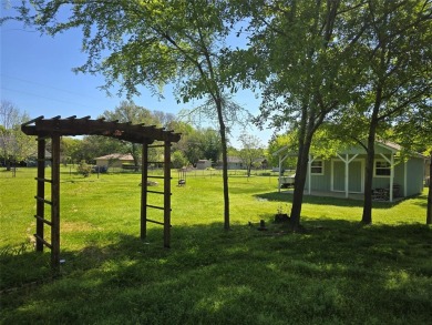 COME CHECK IT OUT! THIS CHARMING 3 BEDROOM 2 BATHROOM 2 CAR on Cedar Creek Country Club in Texas - for sale on GolfHomes.com, golf home, golf lot