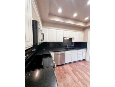 Discover this charming 2-bedroom, 3-bath townhome nestled beside on Lawton Country Club in Oklahoma - for sale on GolfHomes.com, golf home, golf lot