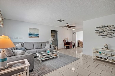 Step into comfort and convenience with this charming and on Leisureville Community Golf Course in Florida - for sale on GolfHomes.com, golf home, golf lot