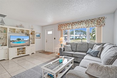 Step into comfort and convenience with this charming and on Leisureville Community Golf Course in Florida - for sale on GolfHomes.com, golf home, golf lot