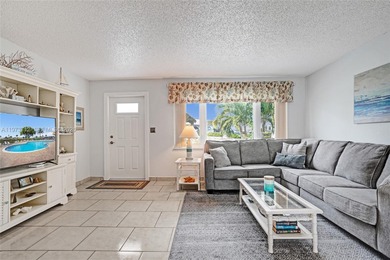 Step into comfort and convenience with this charming and on Leisureville Community Golf Course in Florida - for sale on GolfHomes.com, golf home, golf lot