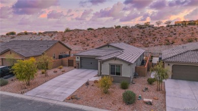 Welcome to your dream home in the prestigious gated neighborhood on Laughlin Ranch Golf Club in Arizona - for sale on GolfHomes.com, golf home, golf lot