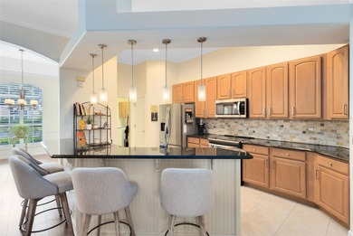 Not your typical golf-front home--this beautifully upgraded on Stoneybrook West in Florida - for sale on GolfHomes.com, golf home, golf lot