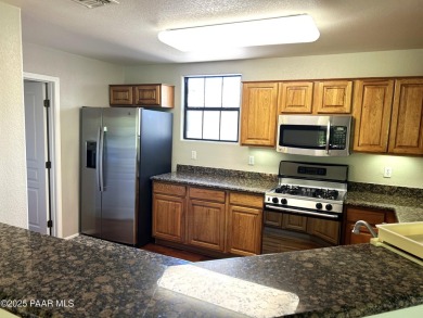 This two story condo is located in one of northern Arizona's on Capital Canyon Club in Arizona - for sale on GolfHomes.com, golf home, golf lot