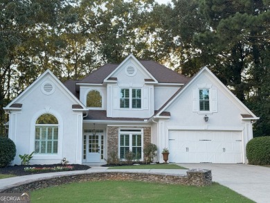 Discover a meticulously designed home that seamlessly blends on Canongate At Olde Atlanta Golf Club in Georgia - for sale on GolfHomes.com, golf home, golf lot