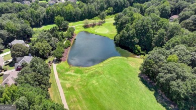 Discover a meticulously designed home that seamlessly blends on Canongate At Olde Atlanta Golf Club in Georgia - for sale on GolfHomes.com, golf home, golf lot