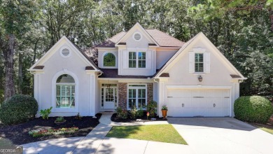 Discover a meticulously designed home that seamlessly blends on Canongate At Olde Atlanta Golf Club in Georgia - for sale on GolfHomes.com, golf home, golf lot