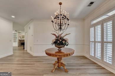 Discover a meticulously designed home that seamlessly blends on Canongate At Olde Atlanta Golf Club in Georgia - for sale on GolfHomes.com, golf home, golf lot