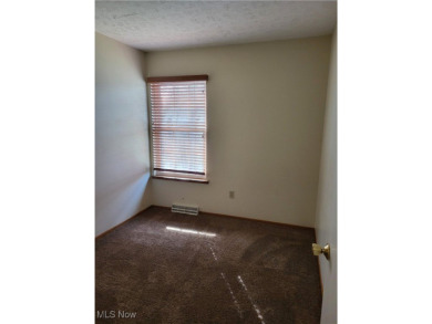 Move right into this 2 bedroom townhouse condominium with its on Cherry Ridge Golf Club in Ohio - for sale on GolfHomes.com, golf home, golf lot