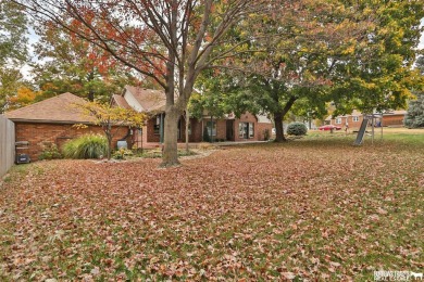 Experience the perfect blend of modern elegance and classic on Syracuse Golf Course in Nebraska - for sale on GolfHomes.com, golf home, golf lot